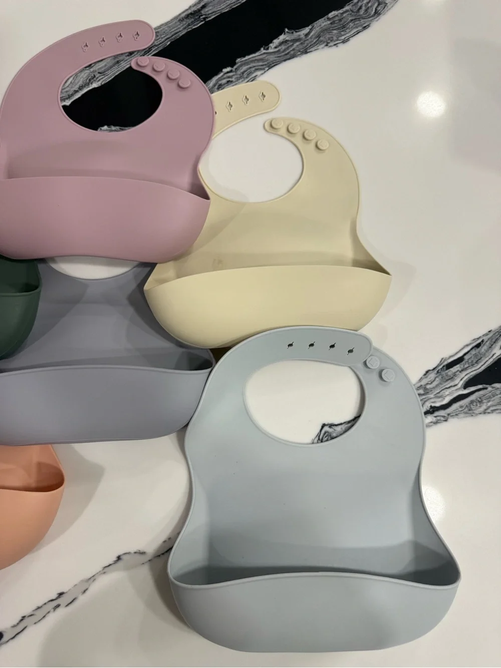 Mushie Adjustable Silicone Baby Bib Set in Pink, Green, Cream, Gray, Peach, Blue